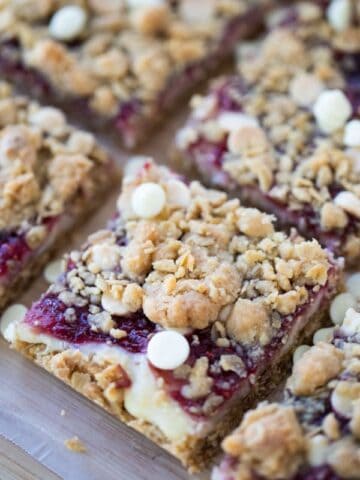 Cookie Bars with White Chocolate and Raspberry cut into squares