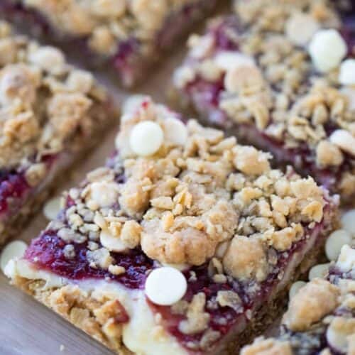 Cookie Bars with White Chocolate and Raspberry cut into squares