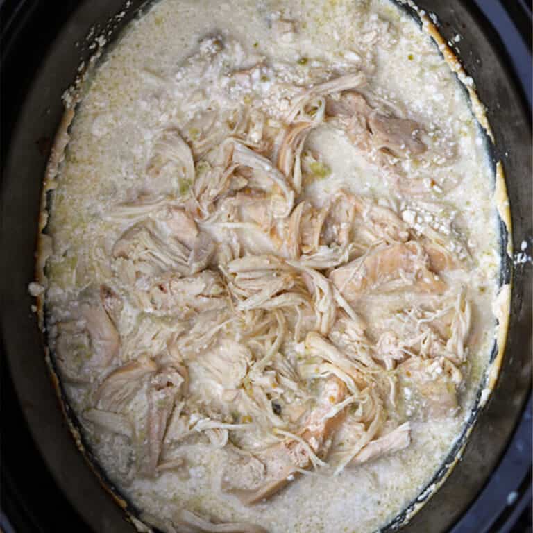 Crockpot Chicken Salsa Verde, shredded chicken in a crockpot