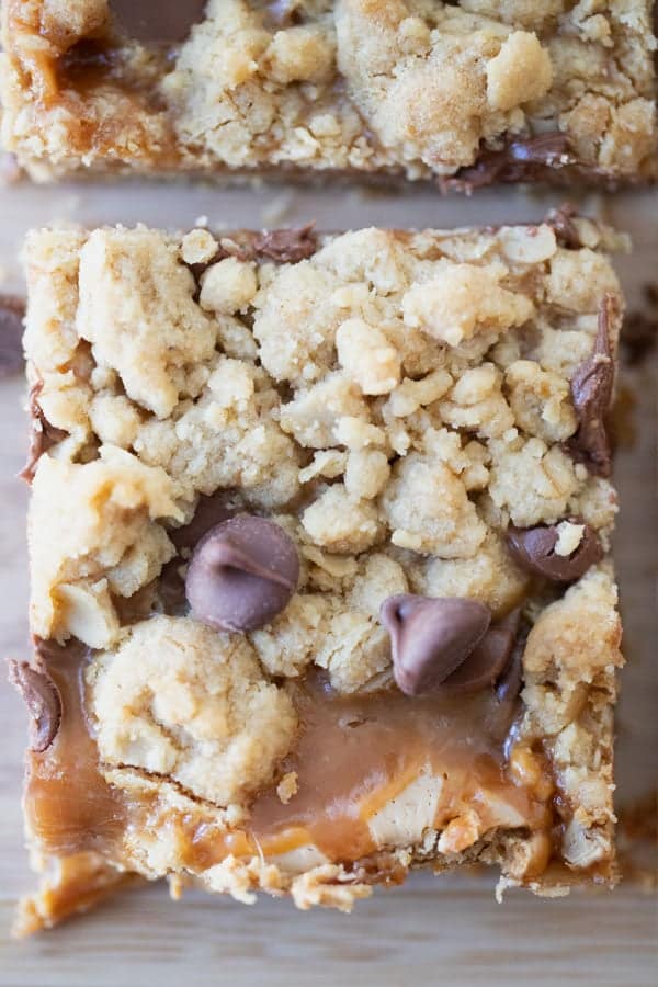 Caramel Peanut Butter Cookie Bars with caramel sauce and peanut butter spread