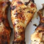 Mediterranean grilled chicken on a white plate, chicken drumstick marinade for bbq