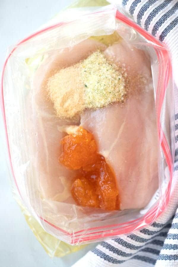 apricot chicken marinade with chicken breasts in a bat