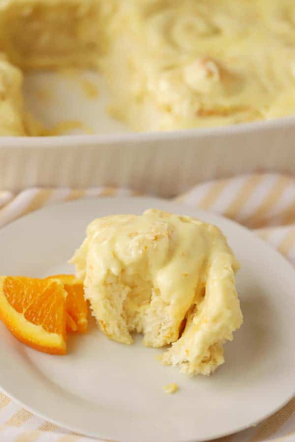 homemade orange sweet rolls with orange dreamcicle frosting