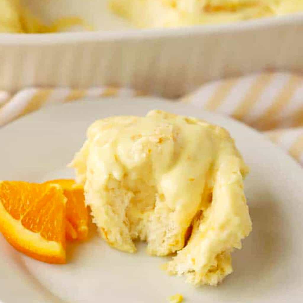 homemade orange sweet rolls with orange creamsicle frosting