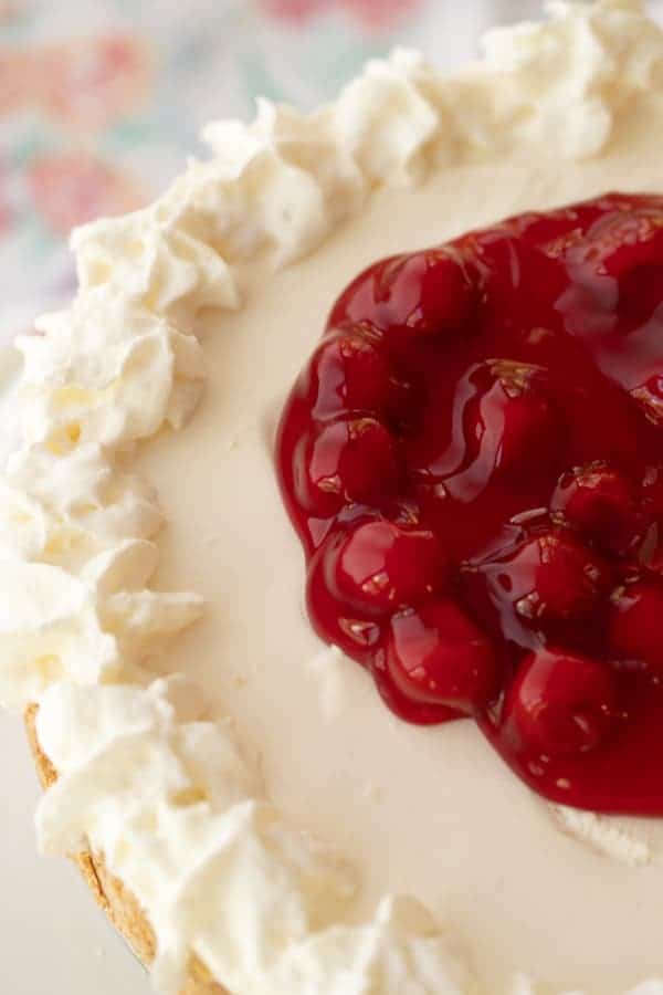 recipe for no bake cheesecake with cherry topping.