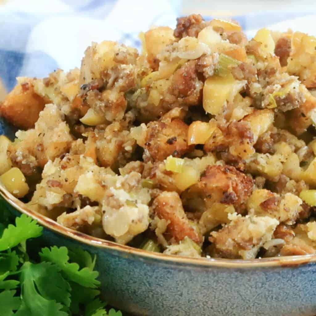sausage apple stuffing recipe in a bowl for your holiday dinner