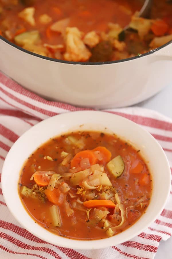 skinny vegetable soup recipe served in a white bowl