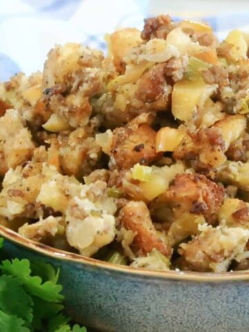 sausage apple stuffing recipe in a bowl for your holiday dinner