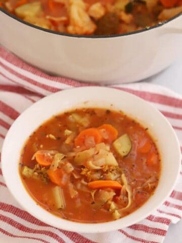 skinny vegetable soup recipe served in a white bowl