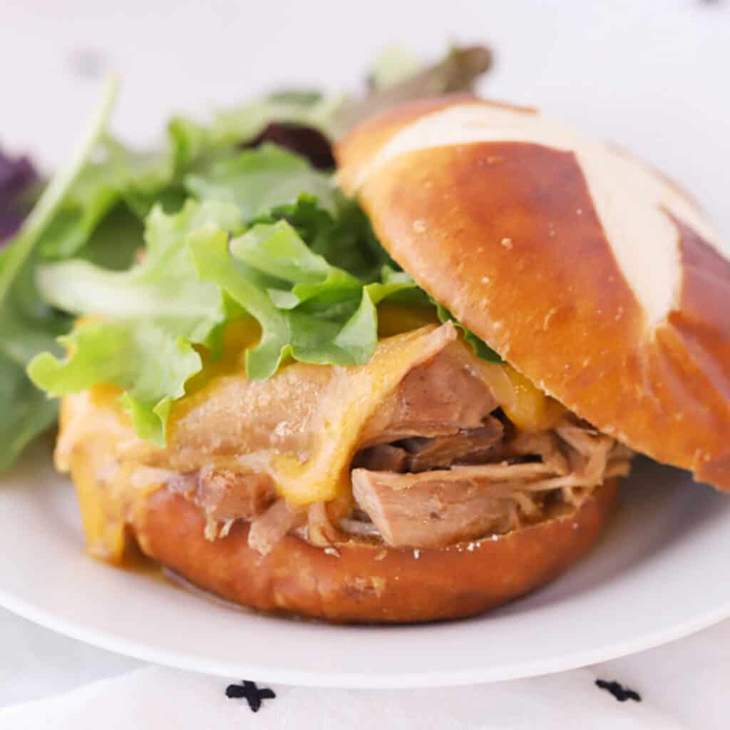 mississippi pork roast on a pretzel bun, mississippi roast pork