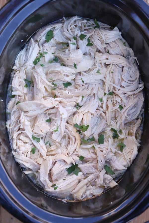 shredded crockpot ranch chicken in a crockpot. Healthy shredded chicken recipes.