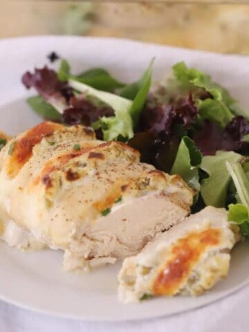 green chile hasselback chicken on a plate, an easy baked chicken recipe
