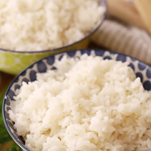 coconut rice in a green bowl, ready to be served