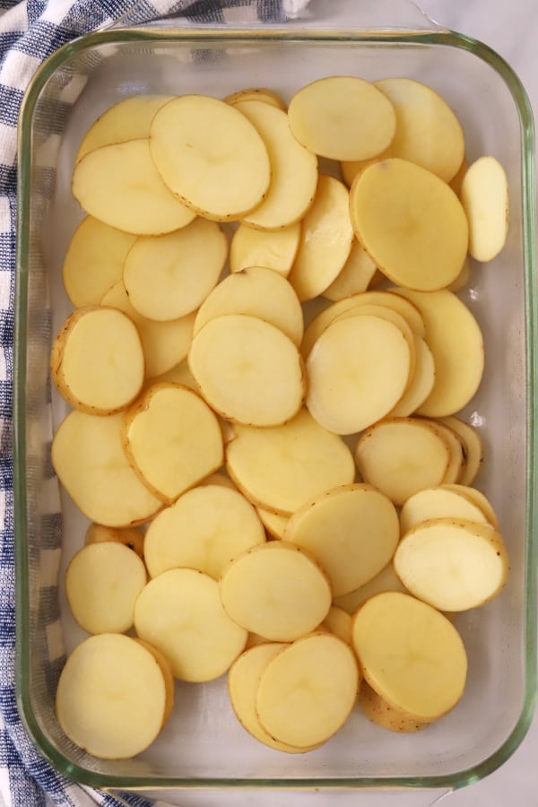 sliced potatoes, ready for gruyere cheese sauce