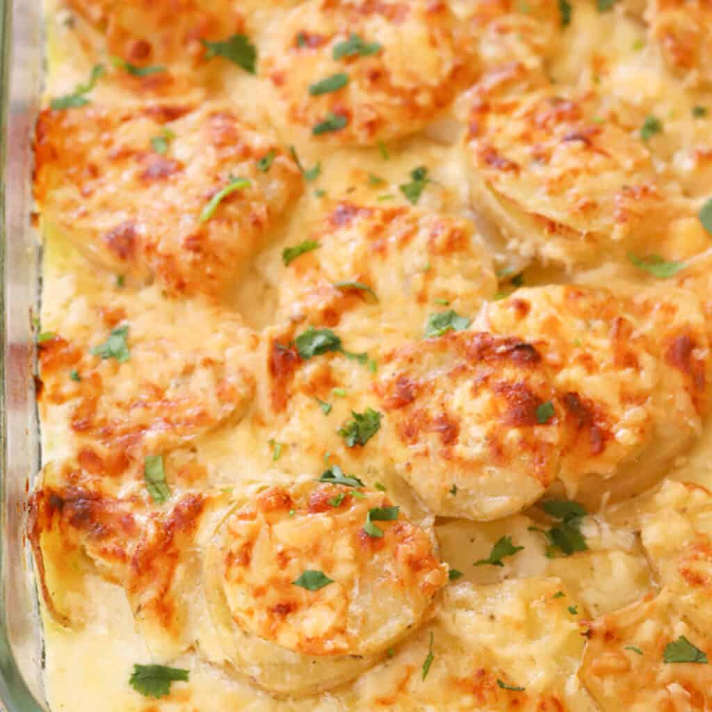 gruyere potatoes in a baking dish.