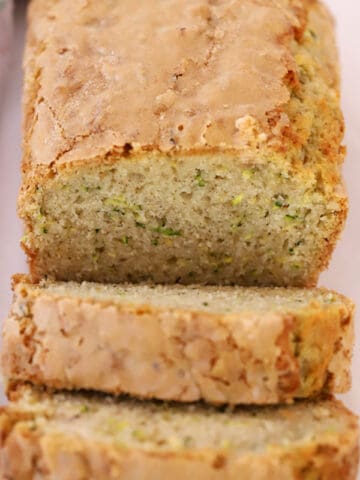 zucchini bread sliced with sugar crunch topping