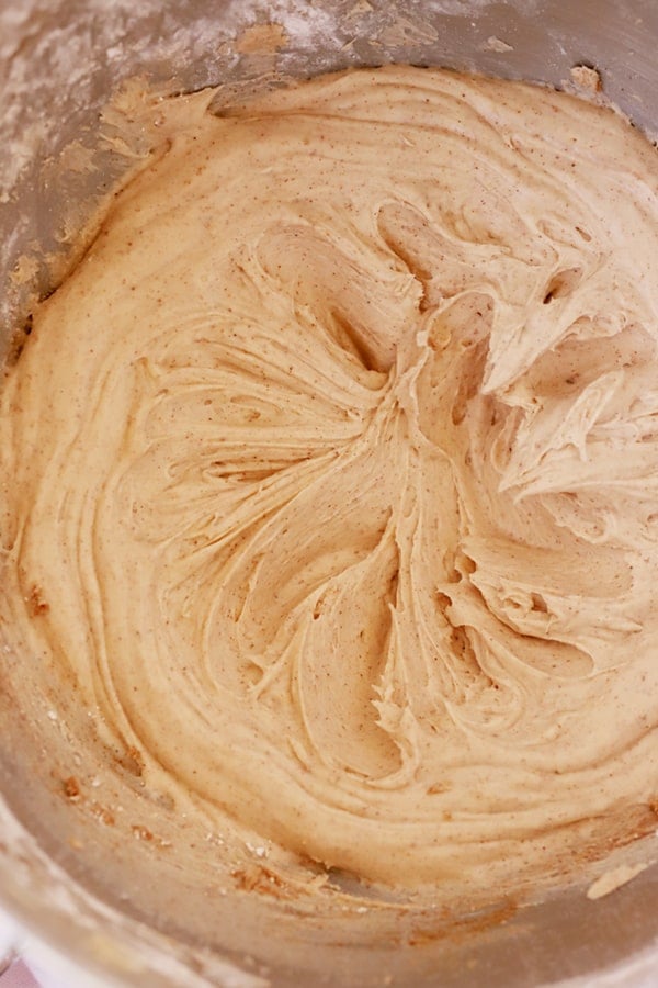 cinnamon buttercream frosting in a large mixing bowl, cinnamon icing recipe.