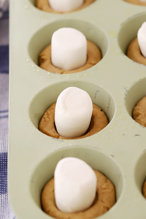 marshmallows on peanut butter cups for peanut butter smore