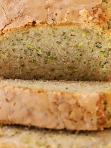 zucchini bread sliced with sugar crunch topping