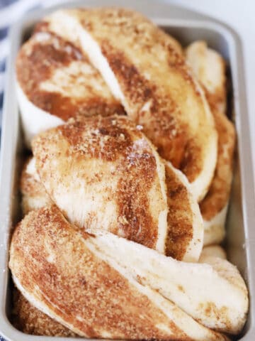 Baked Cinnamon Twist Bread in a loaf pan.