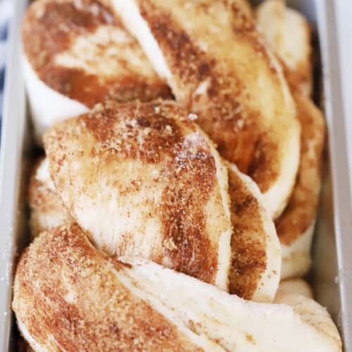 Baked Cinnamon Twist Bread in a loaf pan.