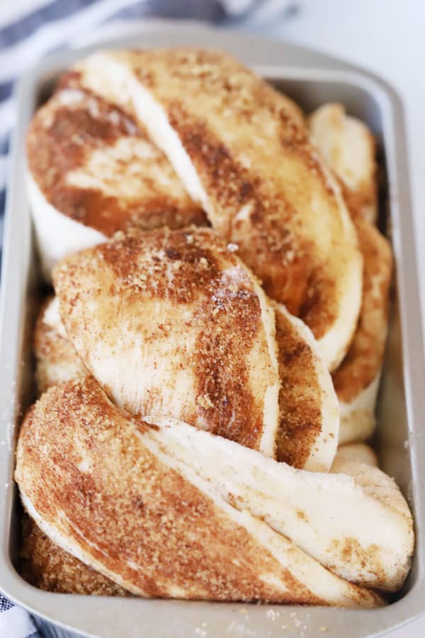 Baked Cinnamon Twist Bread in a loaf pan.