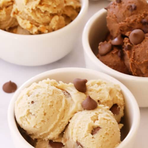 Three bowls with scoops of edible cookie dough.