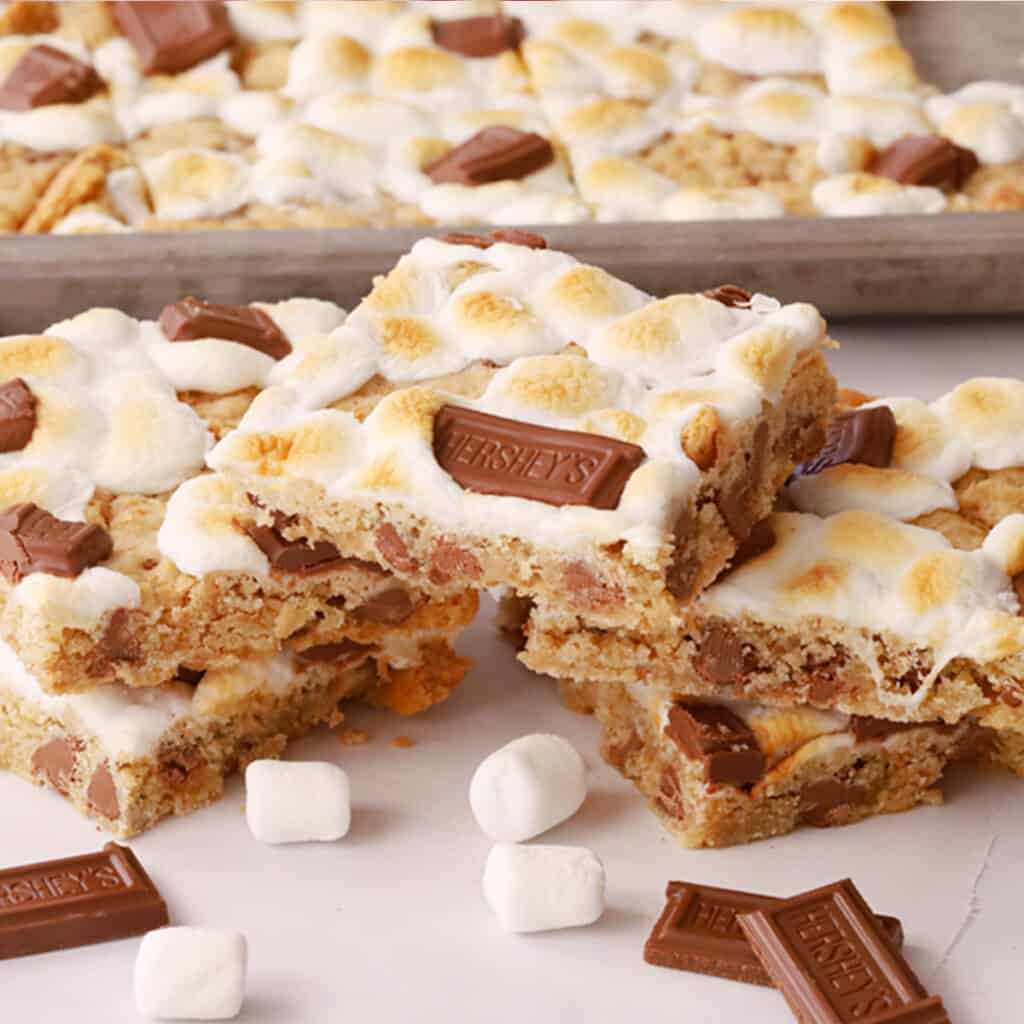 smores cookie bars stacked, a great Memorial day recipe.