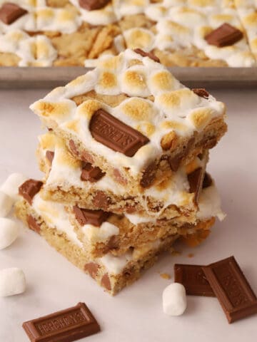 smores cookie bars stacked on top of each other