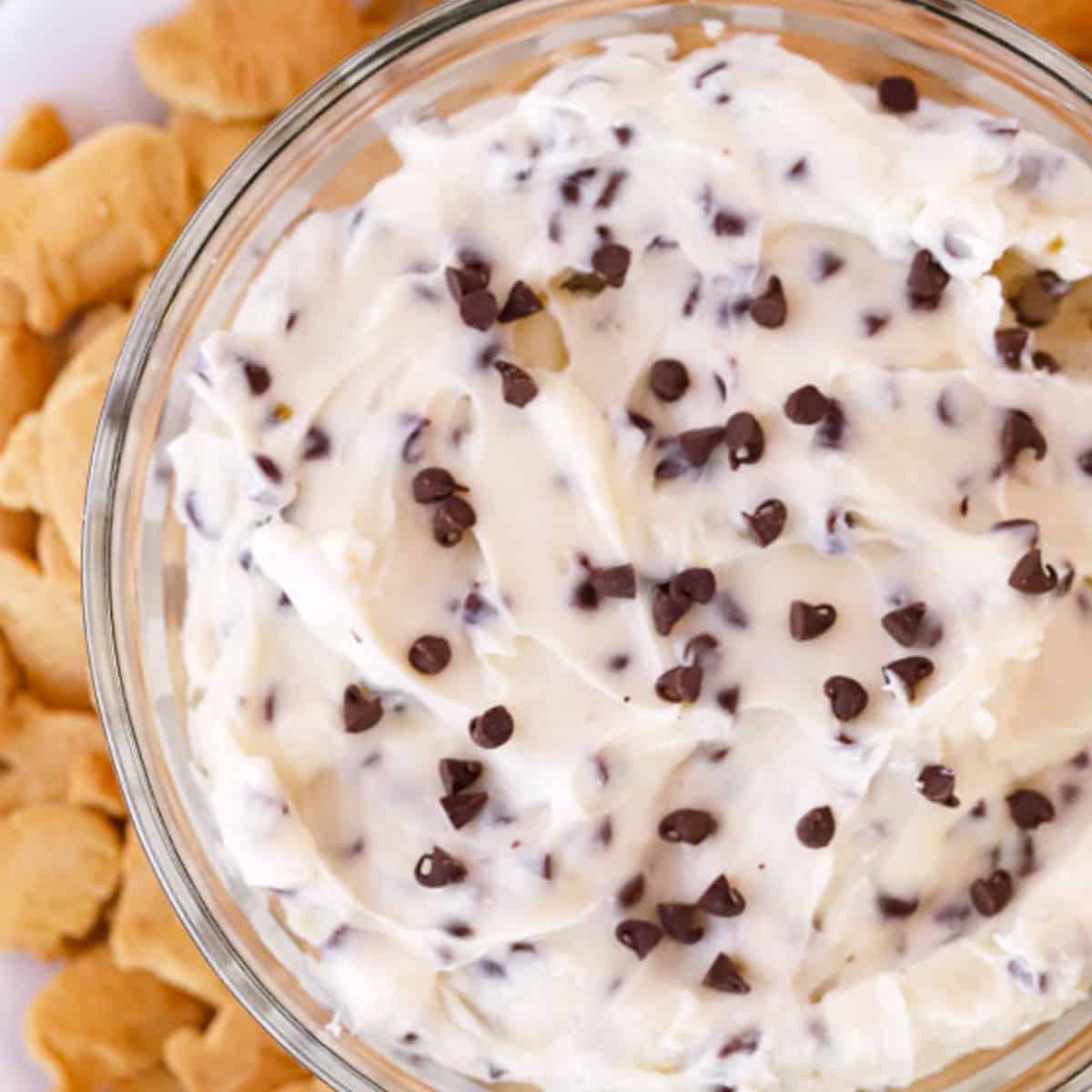 chocolate chip cheesecake dip in a clear bowl