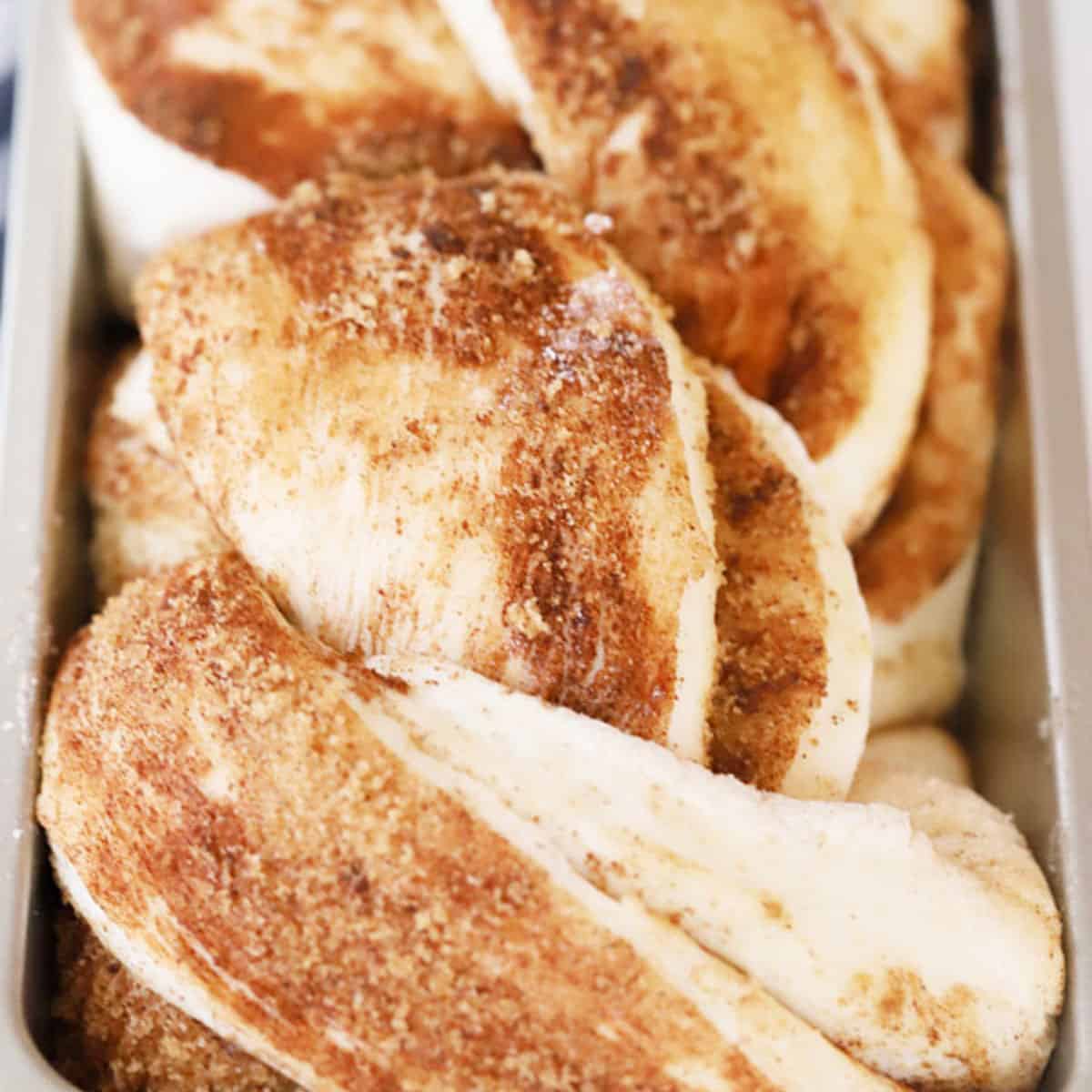 Baked Cinnamon Twist Bread in a loaf pan.