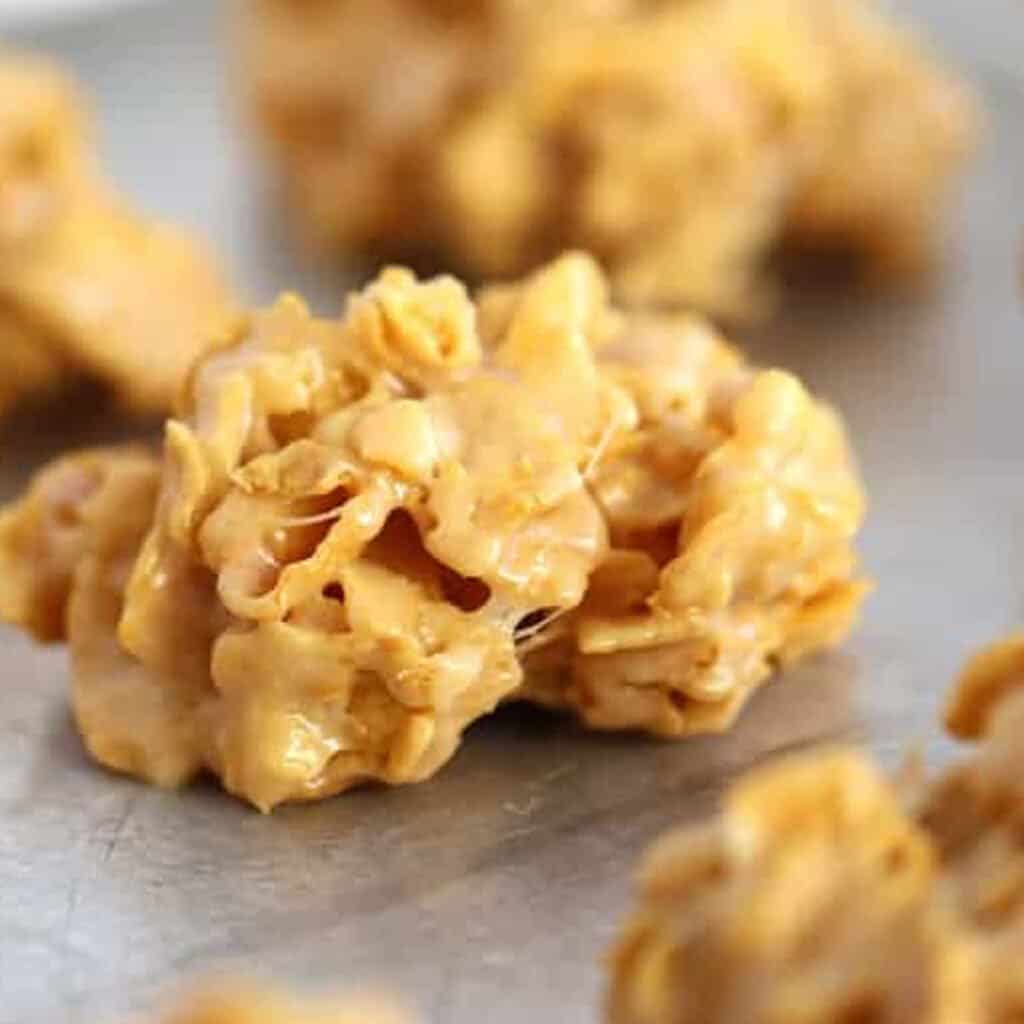 no bake peanut butter cornflake cookies on a countertop.