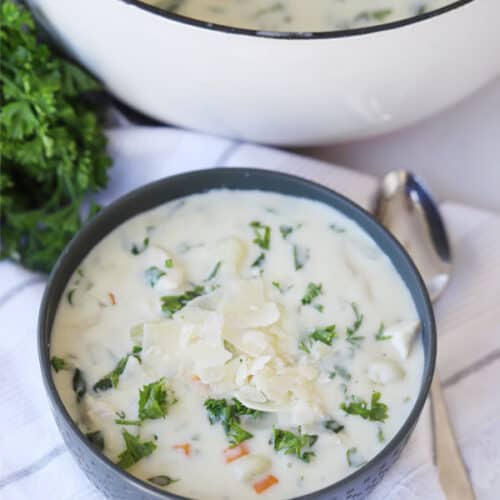 Olive Garden Chicken Gnocchi Soup in a bowl on a table.