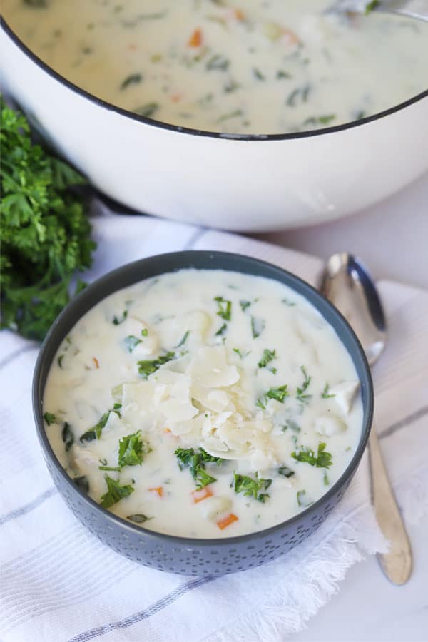 Olive Garden Chicken Gnocchi Soup in a bowl on a table.