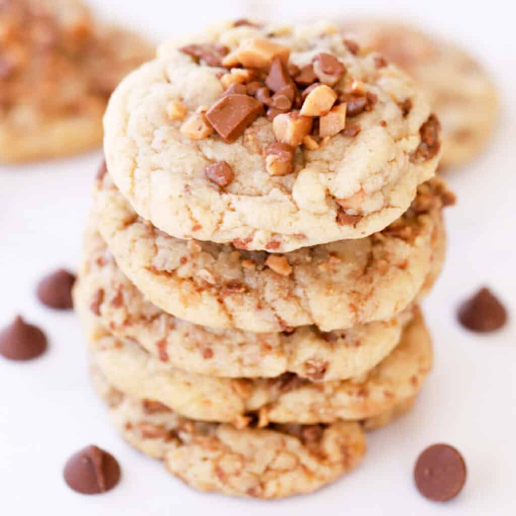 heath toffee cookies on parchment paper