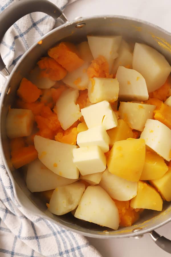 vegetables boiled in a pot for root mash, how to make mashed root vegetables.