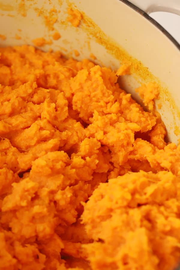 mashed sweet potatoes in a large pot.