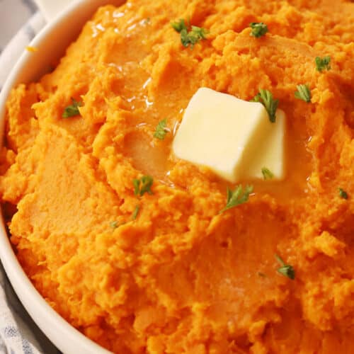 mashed sweet potatoes in a large white bowl
