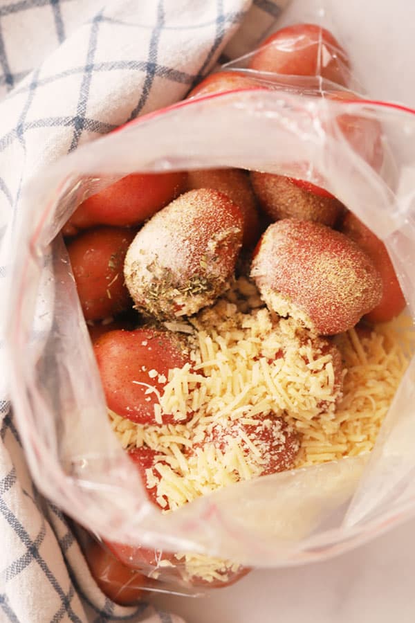 fingerling potatoes and spices in a bag