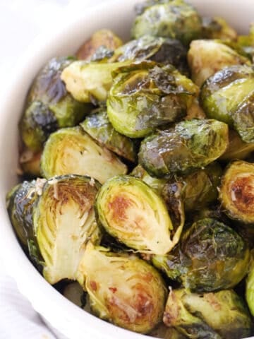 Roasted Brussels sprouts in a serving dish.
