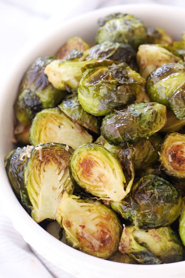 Roasted Brussels sprouts in a serving dish.