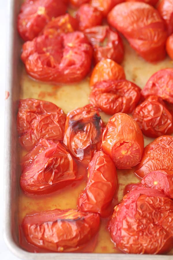 marinara sauce ingredients on a baking sheet, fresh tomato fresh marinara sauce, fresh tomato marinara. 