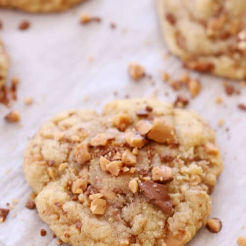 heath toffee cookies on parchemnt paper