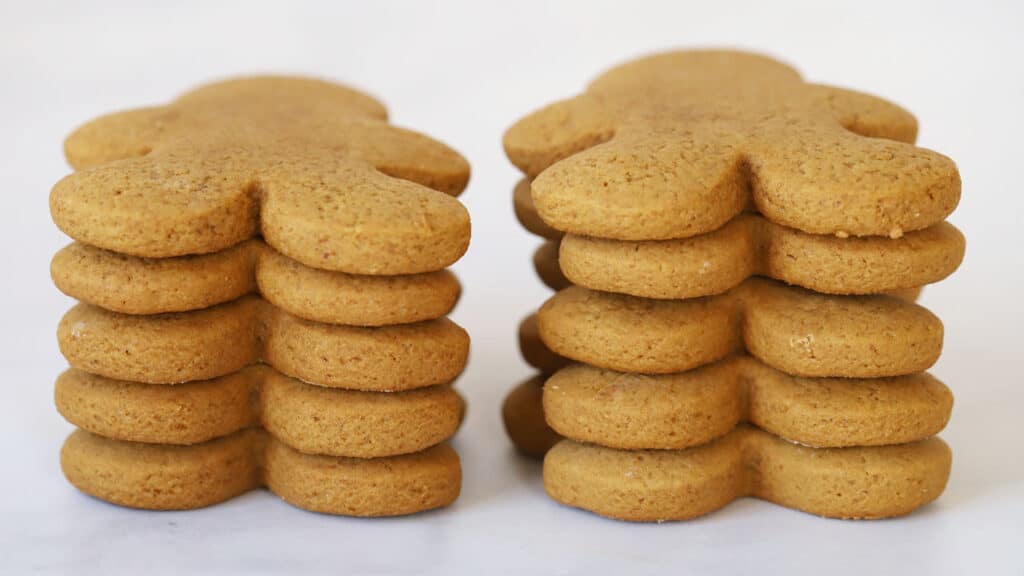 gingerbread men, cooked and cooled, in a stack.