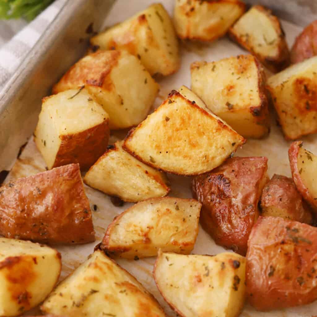 oven roasted red potatoes in a baking sheet.