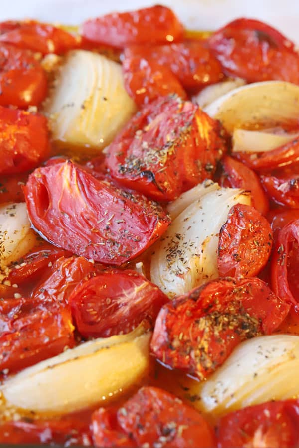 roasted tomatoes and onions in a glass baking dish, marinara sauce fresh tomatoes, marinara sauce recipe with fresh tomatoes, marinara with fresh tomatoes .
