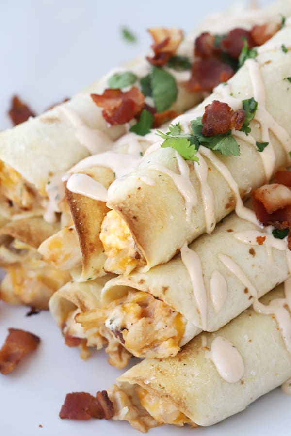 chicken taquiots with chicken and bacon, easy dinner recipe, oven baked bbq chicken and cheese taquitos