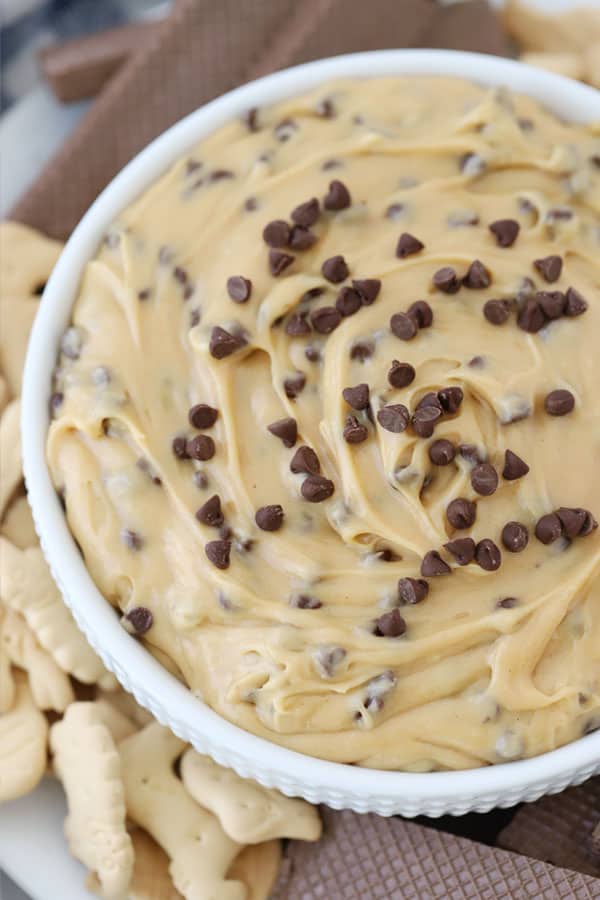 peanut butter dip with chocolate chips in a bowl with chocolate chips