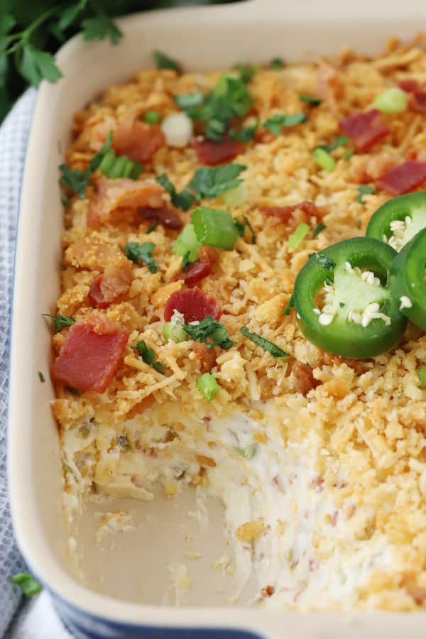 jalapeno popper dip with bacon recipe in a baking dish