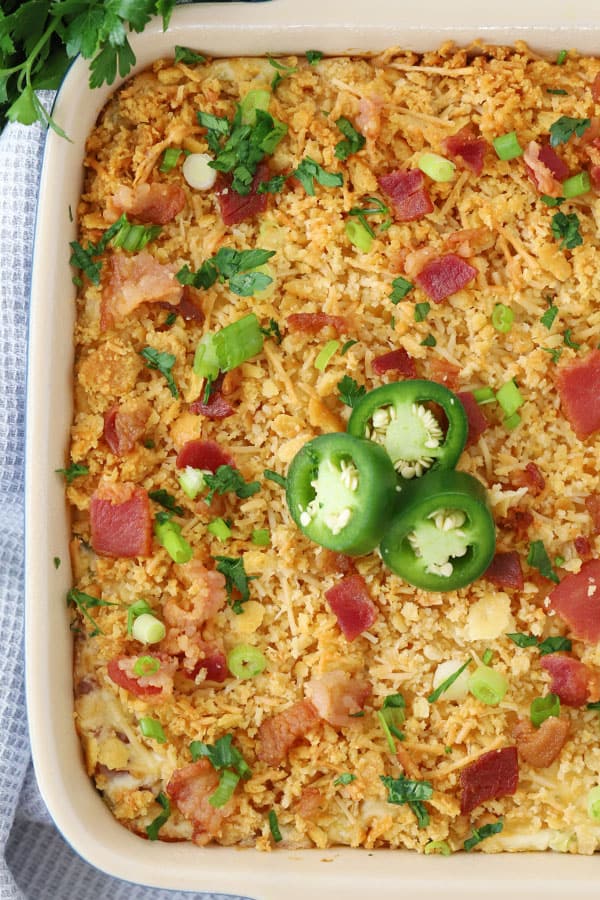 Jalapeno popper dip in a white serving dish.